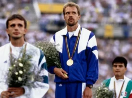 Andrey Perlov (centre) won a gold medal at the Barcelona Olympics